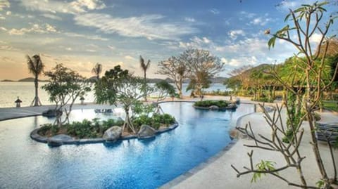 Outdoor pool, pool umbrellas, sun loungers