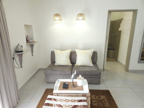 Superior Double Room | Living area | Flat-screen TV, DVD player, toys