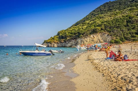 On the beach, beach towels, rowing