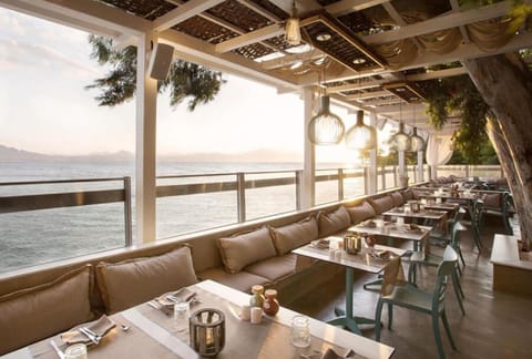 Breakfast, lunch, dinner served; Mediterranean cuisine, beach views 