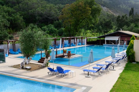 2 outdoor pools, pool umbrellas, sun loungers