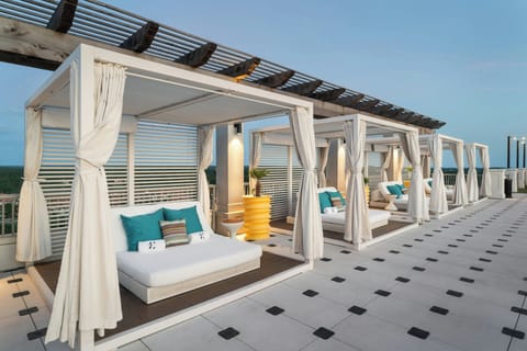 Outdoor pool, cabanas (surcharge), pool umbrellas