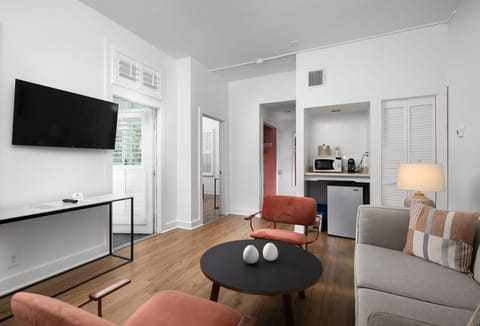 Premium Suite, 1 King Bed with Sofa bed | Living area | 37-inch flat-screen TV with cable channels, TV