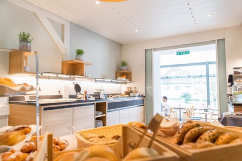 Breakfast, lunch, dinner served; local cuisine, alfresco dining