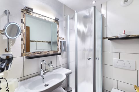 Shower, free toiletries, hair dryer, bathrobes