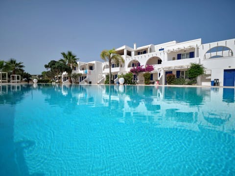 Seasonal outdoor pool, pool umbrellas, sun loungers