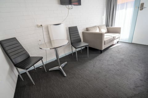 Poolside Queen and Single | Living area | 40-inch Smart TV with digital channels