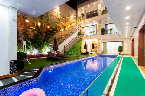 Outdoor pool, open 8:00 AM to 8:00 PM, sun loungers