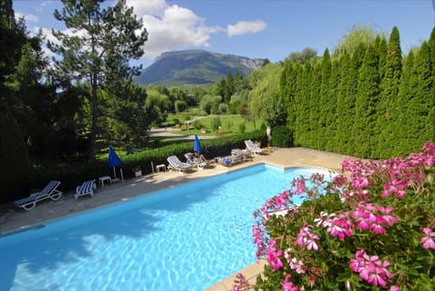 Outdoor pool, open 10:00 AM to 7:00 PM, sun loungers