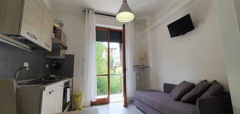 Family Studio | Living area | 28-inch flat-screen TV with digital channels, TV