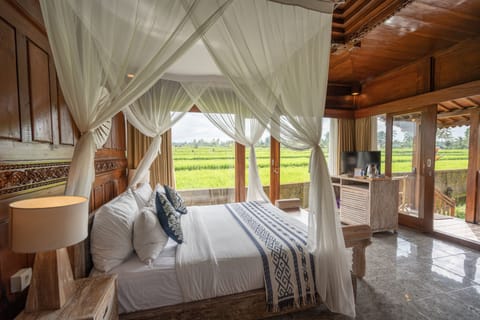 Family Room, 2 Bedrooms, Garden View | Minibar, in-room safe, individually decorated, individually furnished