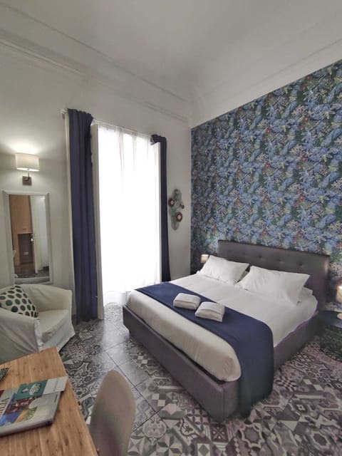 Design Double Room, 1 Queen Bed, City View | Individually furnished, desk, laptop workspace, free WiFi