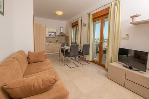Superior Apartment, 2 Bedrooms, Sea View | Living area | Flat-screen TV