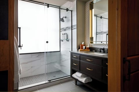 Designer toiletries, hair dryer, bathrobes, towels