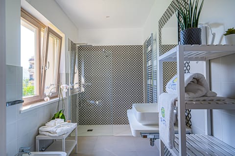 Superior Double or Twin Room, Terrace | Bathroom | Shower, rainfall showerhead, hair dryer, slippers