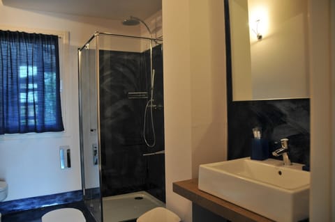 Double Room | Bathroom | Shower, hair dryer, bathrobes, slippers