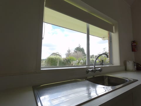 One Bedroom Queen | Private kitchen | Microwave, electric kettle, toaster, highchair