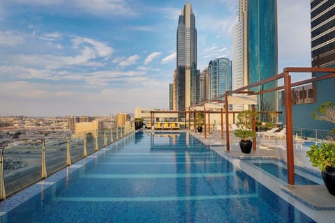 Outdoor pool, pool umbrellas, sun loungers