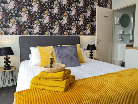 Deluxe Double Room | Hypo-allergenic bedding, desk, blackout drapes, iron/ironing board