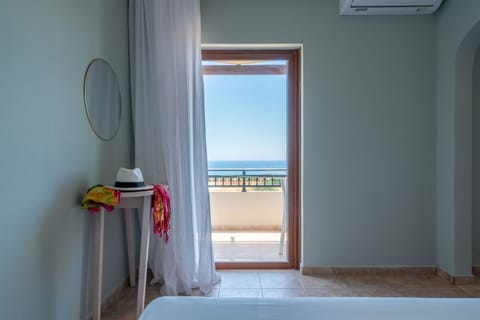Family Apartment, Sea View | Individually furnished, laptop workspace, free WiFi, bed sheets