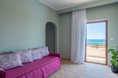 Family Apartment, Sea View | Living area | TV