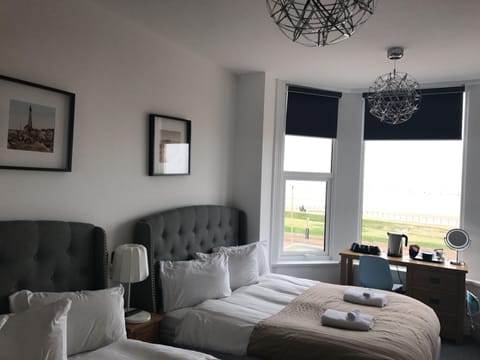 Economy Room, Sea View | Desk, laptop workspace, iron/ironing board, free WiFi