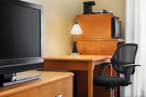 Premium bedding, pillowtop beds, desk, laptop workspace