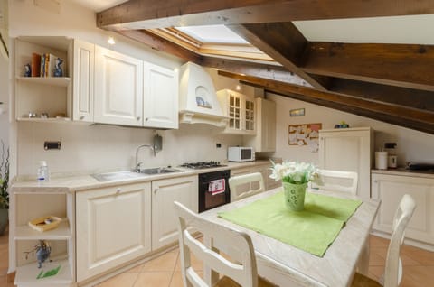 Apartment, 2 Bedrooms | Private kitchen | Full-size fridge, microwave, oven, stovetop