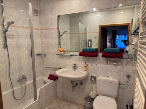 Comfort Double Room | Bathroom | Hair dryer, towels, soap, shampoo