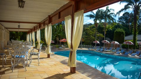 Indoor pool, outdoor pool, pool umbrellas, sun loungers