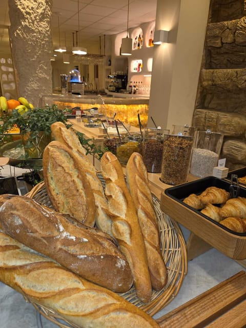 Daily buffet breakfast (EUR 18 per person)