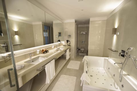 Penthouse, 1 King Bed, Jetted Tub | Bathroom | Eco-friendly toiletries, hair dryer, bathrobes, slippers