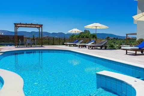 Seasonal outdoor pool, pool umbrellas, sun loungers