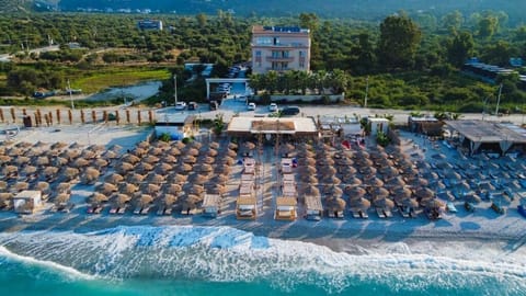 Private beach, white sand, sun loungers, beach umbrellas