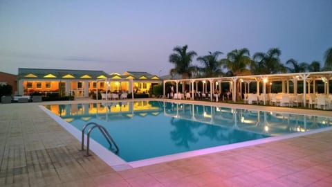 Seasonal outdoor pool, pool umbrellas, sun loungers