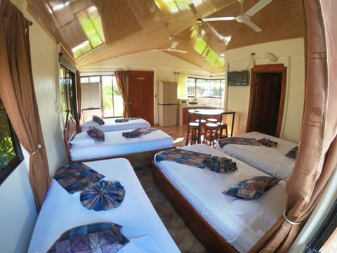 Family Room, 1 Bedroom | Pillowtop beds, in-room safe, desk, laptop workspace