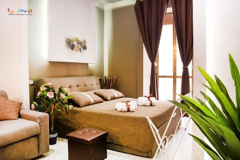 Deluxe Quadruple Room, Balcony, City View (Hug) | Free WiFi, bed sheets