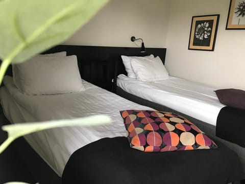 Desk, iron/ironing board, free cribs/infant beds, rollaway beds