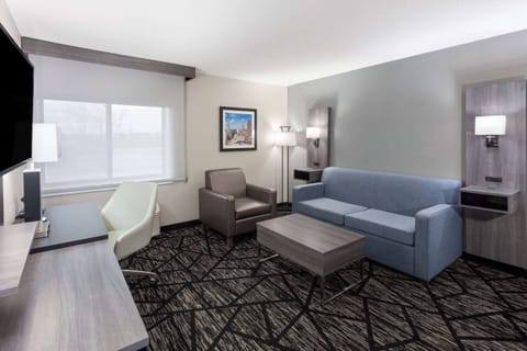 Suite, 1 King Bed, Non Smoking (Two-Room Suite) | Premium bedding, desk, iron/ironing board, free cribs/infant beds