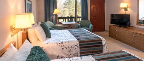 Deluxe Double Queen with Private Balcony | Individually decorated, individually furnished, laptop workspace