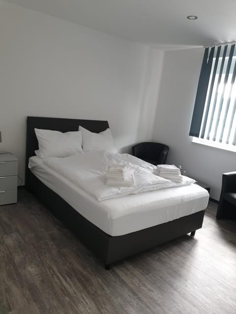 Blackout drapes, soundproofing, free WiFi, bed sheets