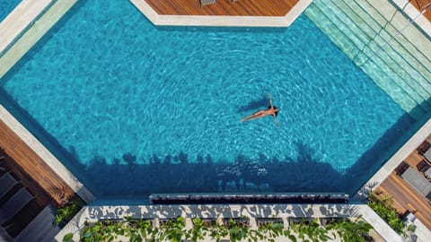 Outdoor pool, open 10:00 AM to 7:00 PM, pool umbrellas, sun loungers