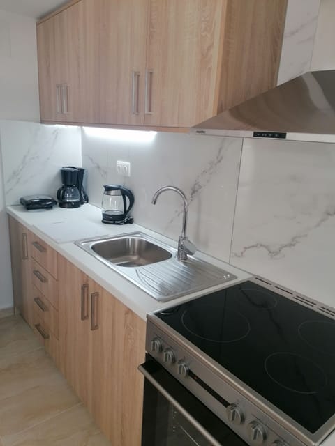 Deluxe Apartment (Duplex, 4 Persons) | Private kitchenette | Full-size fridge, oven, stovetop, coffee/tea maker