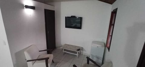 Superior Quadruple Room | Living room | 32-inch LCD TV with cable channels, TV