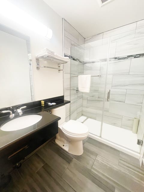 Desk, laptop workspace, blackout drapes, iron/ironing board