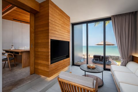 Beachfront suite pool villa | Living area | 50-inch LED TV with digital channels