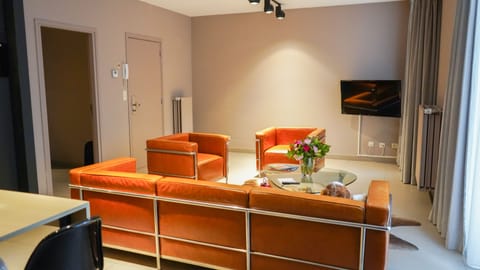 Apartment, 2 Bedrooms | Living area | Flat-screen TV