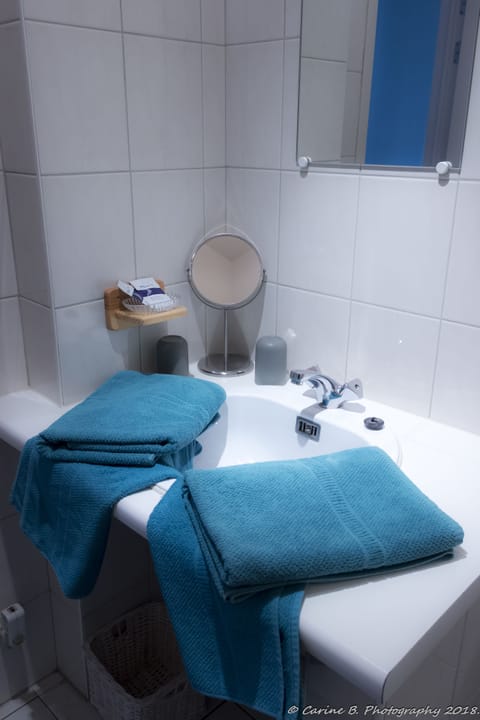 Shower, free toiletries, hair dryer, towels