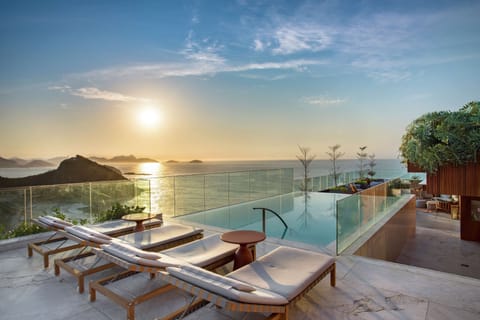 2 outdoor pools, open 8:00 AM to 8:00 PM, pool umbrellas, sun loungers