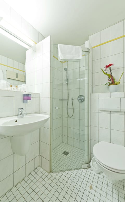 Hair dryer, slippers, towels, soap